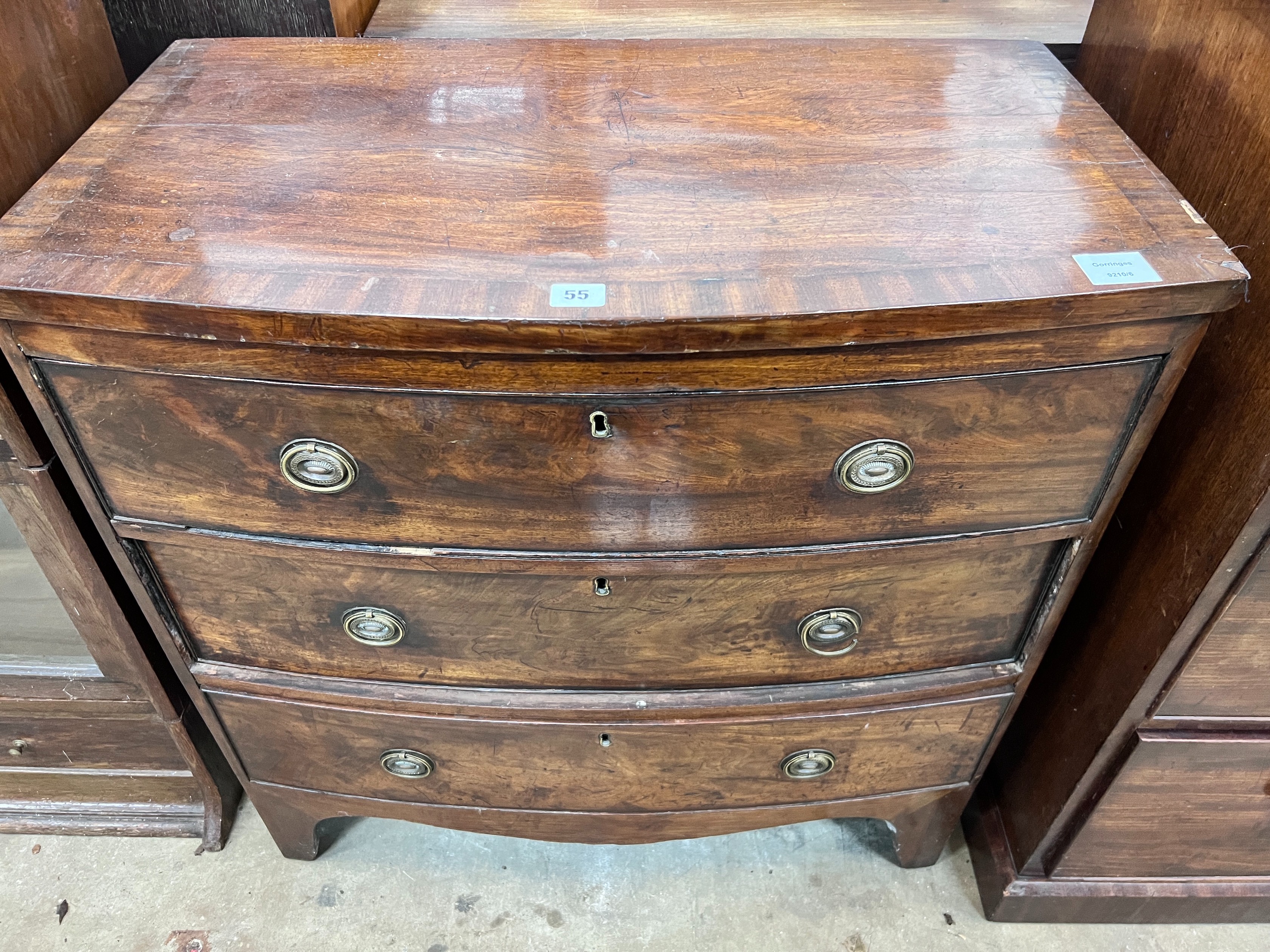 A small Regency banded mahogany three drawer bowfront chest, width 77cm, depth 43cm, height 77cm *Please note the sale commences at 9am.